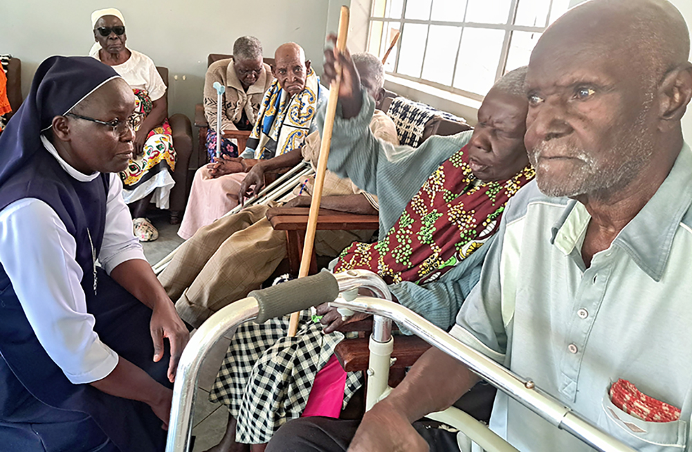 Sr. Monica Oduory engages with the elderly at St. Catherine's Home for the Elderly in Busia, a town in western Kenya, Sept. 27, 2024. (GSR photo/Doreen Ajiambo)