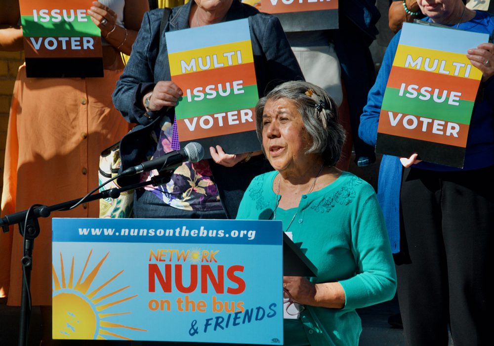 Sr. Alicia Gutierrez speaks at the Nuns on the Bus stop at the Circle Resource Center Oct. 8 in Chicago, where she is executive director. (GSR photo/Dan Stockman)