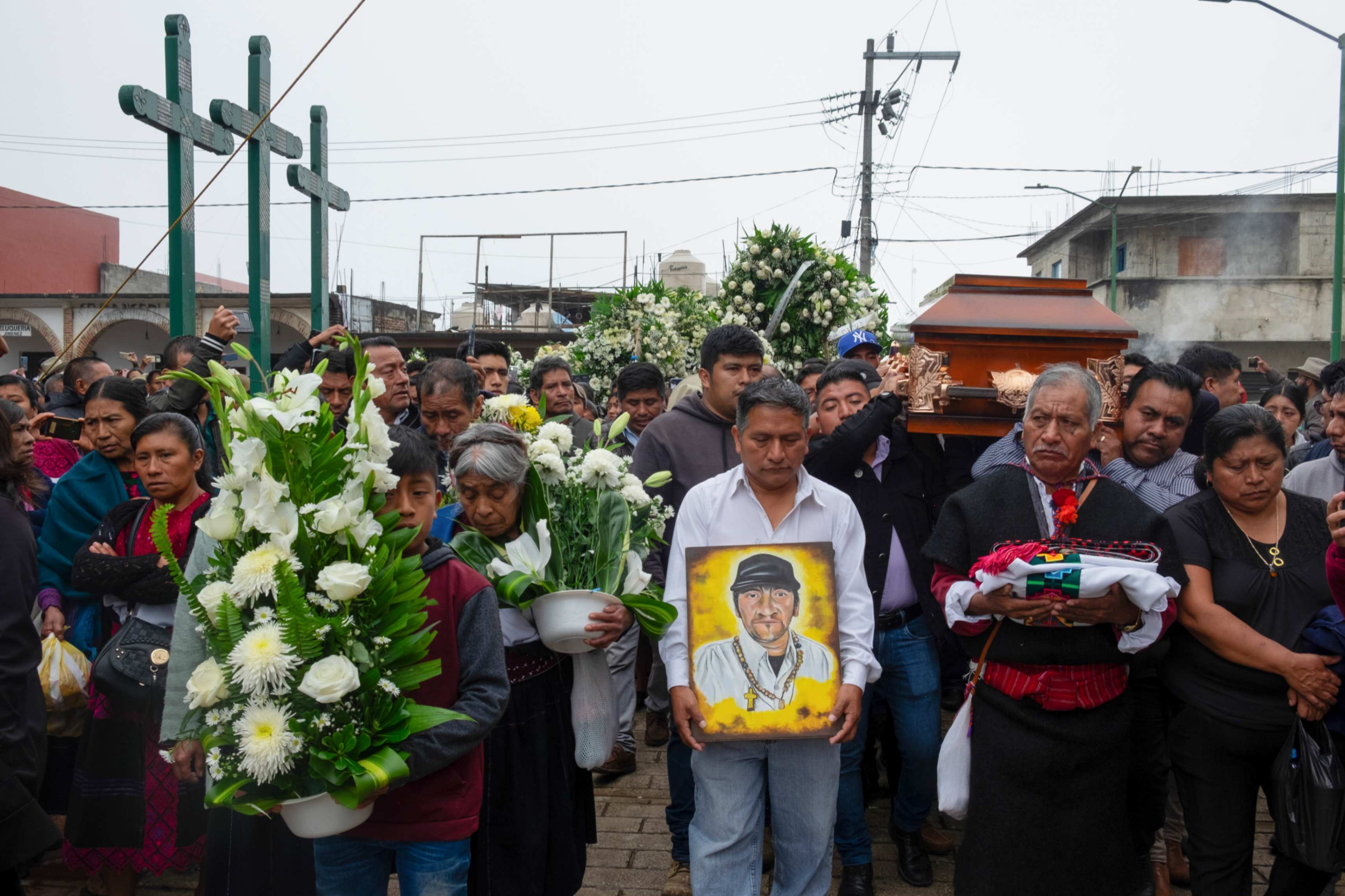 People take part in a funeral procession in San Andrés Larráinzar, Chiapas state, Mexico, on Oct. 22, 2024, for Catholic priest and activist Fr. Marcelo Pérez. The priest was killed for confronting criminal gangs. (AP/Isabel Mateos)