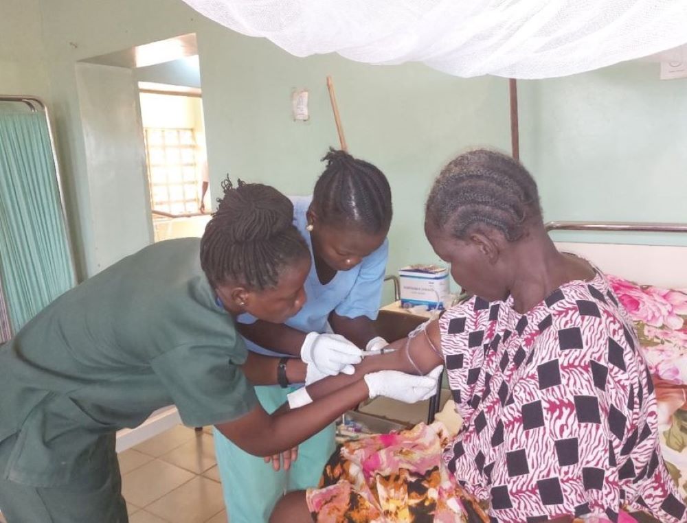 A nurse trainee attends to a patient in a clinic in Wau, South Sudan. 