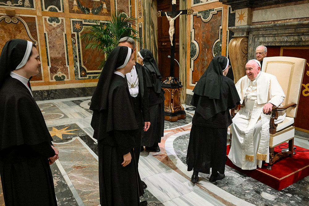 Pope Francis greets a group of Augustinian nuns from San Ildefonso Monastery in Talavera de la Reina, Spain, during a meeting at the Vatican Nov. 7. (OSV News/CNS)