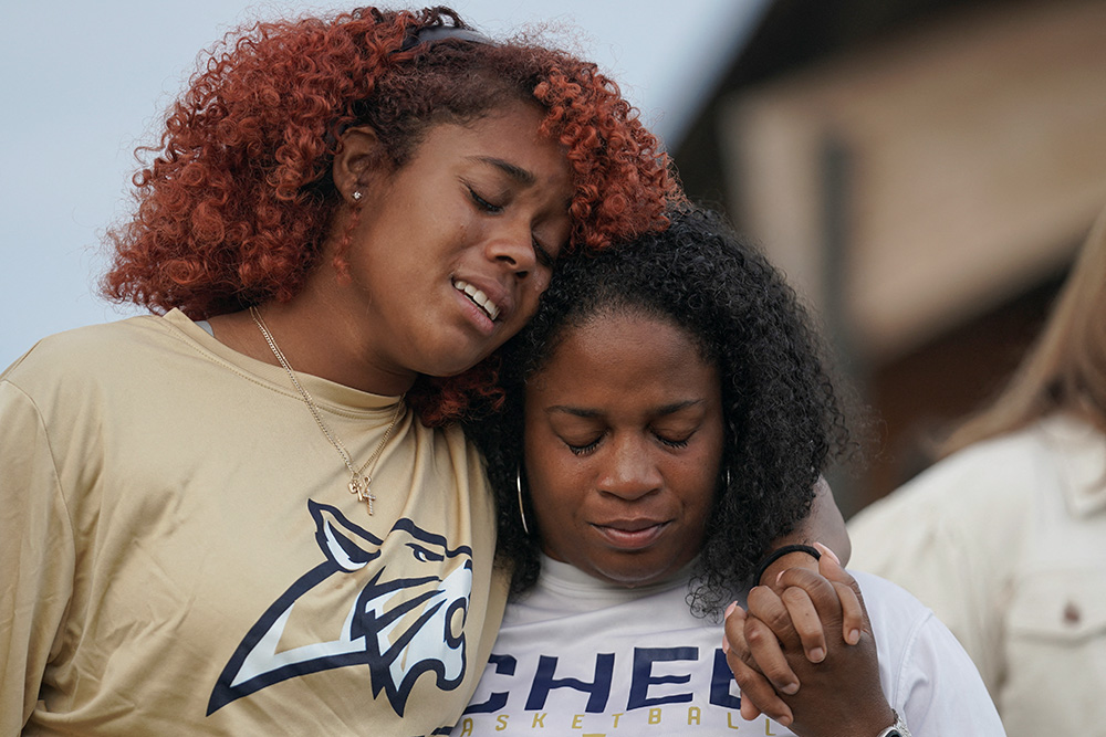 Women mourn as they attend a vigil at Jug Tavern Park in Winder, Ga., Sept. 4, 2024, following a shooting that day at Apalachee High School in Winder. (OSV News/Reuters/Elijah Nouvelage)