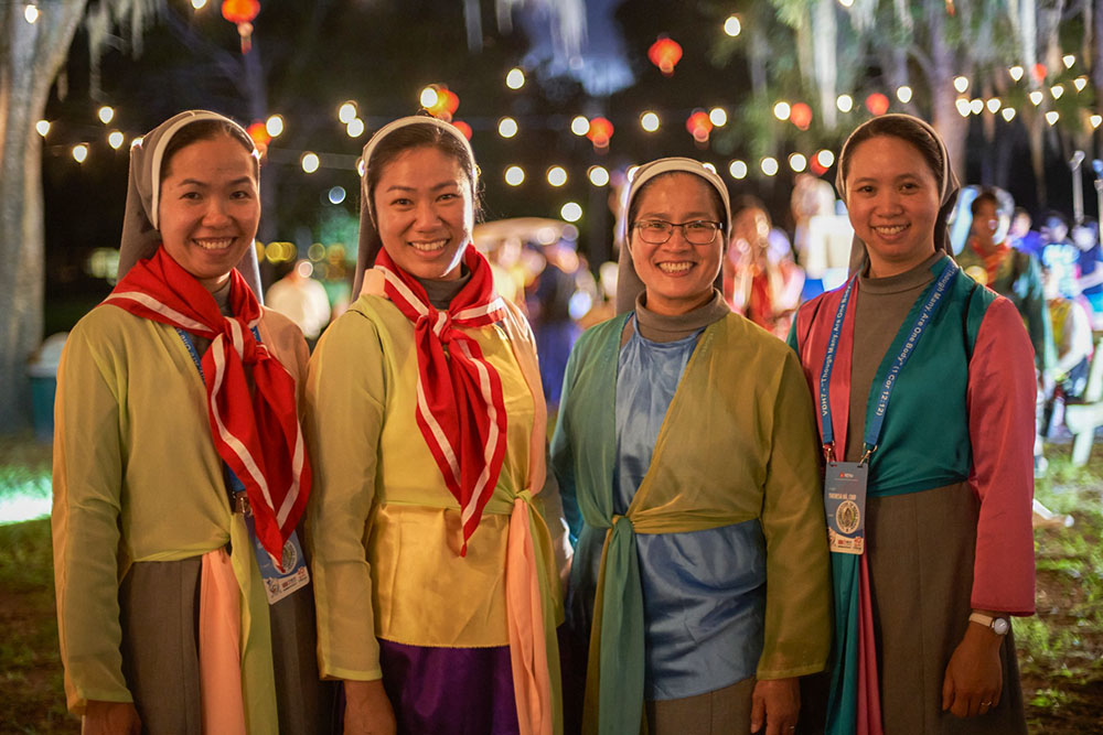 Sisters of Congregation of Mary Queen don on traditional Vietnamese attire during the convention's Cultural Night. (VEYM Photography Team via Facebook)