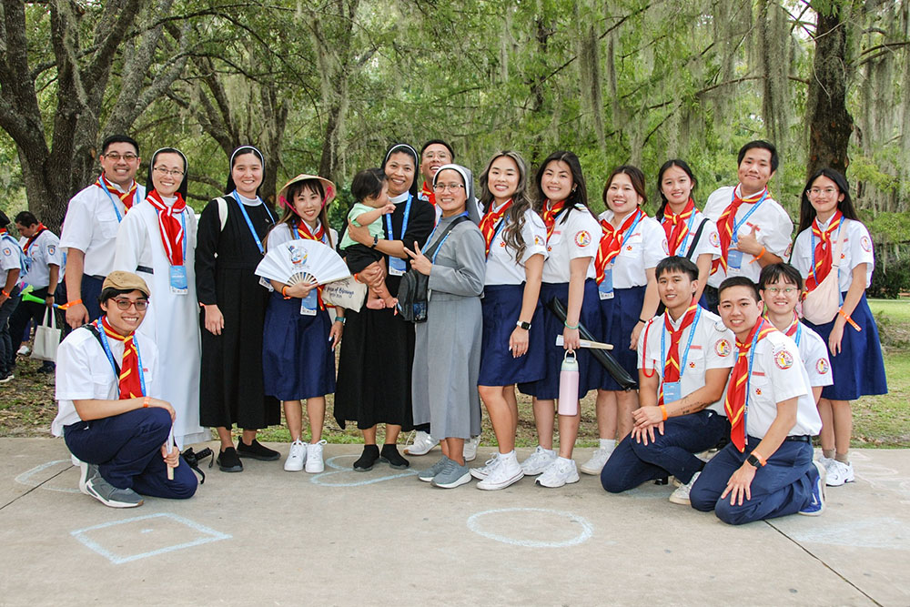 Dominican Sisters of Mary Immaculate Province, Daughters of Our Lady of the Holy Rosary and Sisters of Congregation of Mary Queen pose for a photo with a local VEYM chapter. (VEYM Photography Team via Facebook)