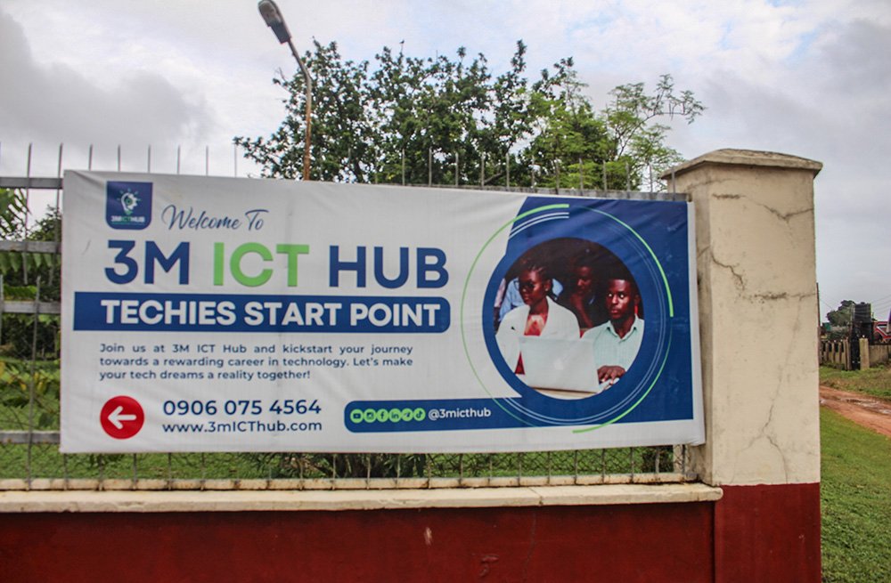 A sign in front of the Medical Missionaries of Mary Convent in Benin City, Nigeria, informs the public about the 3M ICT Hub where young Nigerians learn digital skills. (GSR photo/Valentine Benjamin) 