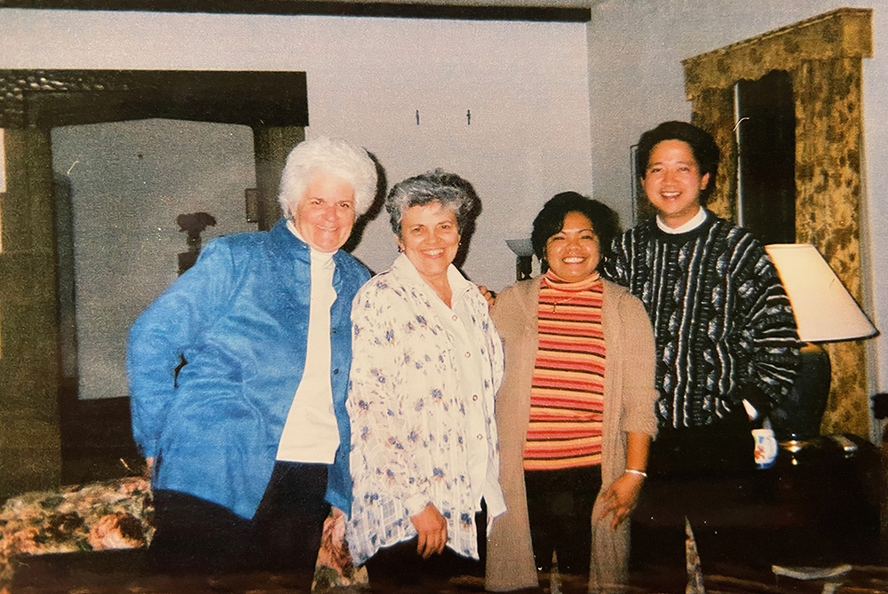 Social Service Srs. Michele Walsh, Carol Pack, Nodelyn Abayan and Fr. Joel Henson at the formation house in February 2003. (Courtesy of Nodelyn Abayan)