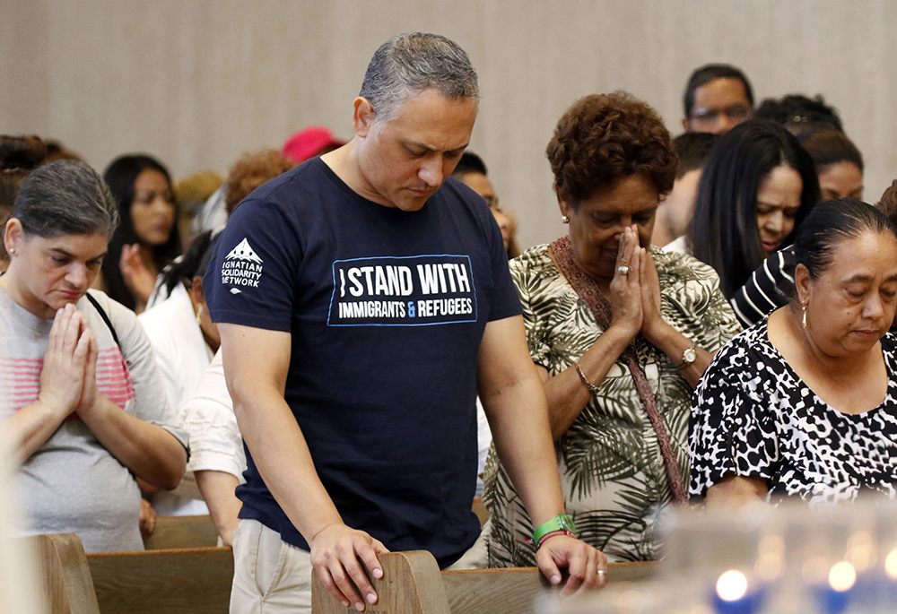 Worshippers pray during a Spanish-language Mass for immigrants July 13, 2019, at St. Frances Xavier Cabrini Shrine in New York City. The liturgy was part of the shrine's daylong celebration marking the birthday of its patroness. An Italian immigrant born July 15, 1850, Mother Cabrini was the first U.S. citizen to be canonized and is the patron saint of immigrants. (CNS/Gregory A. Shemitz)