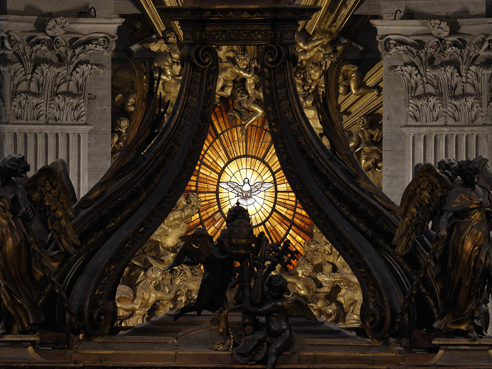 The Holy Spirit window is pictured through the Baldacchino in St. Peter's Basilica at the Vatican. (CNS/Paul Haring)