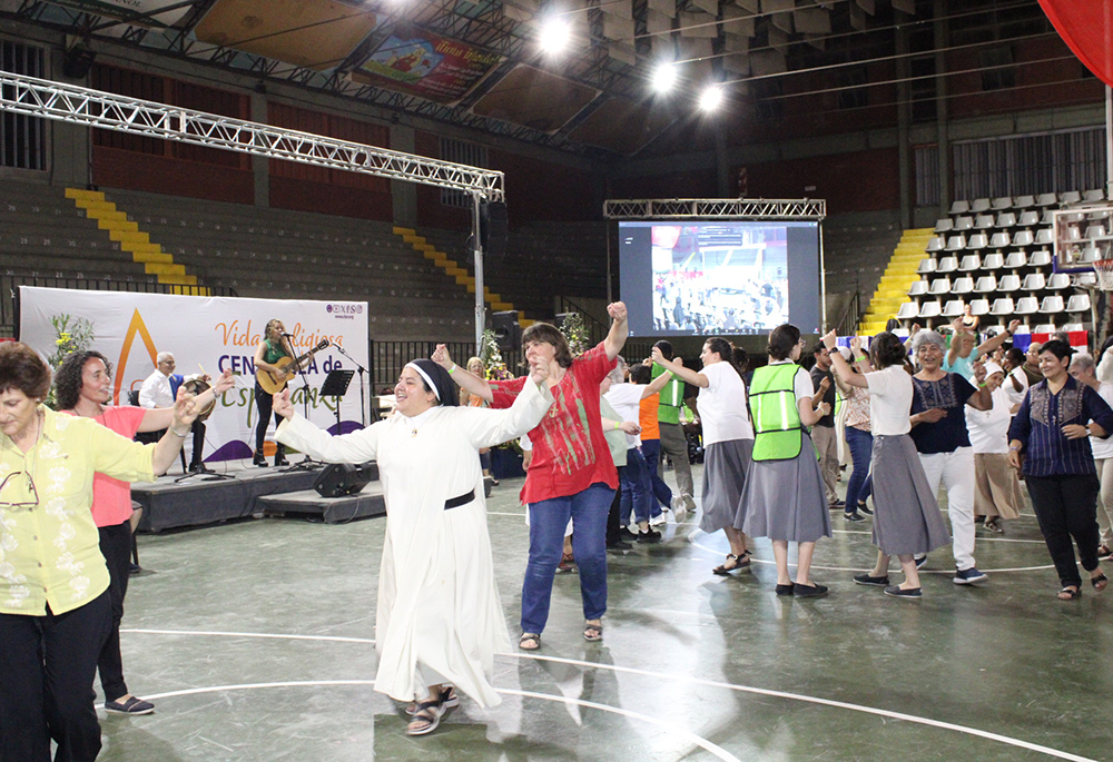 Sisters from Argentina dance Chacarera, a traditional rural Argentine dance performed in pairs, during the folk music celebration of the V Latin American and Caribbean Congress of Religious Life in Cordoba, Argentina. (GSR photo/Helga Leija)