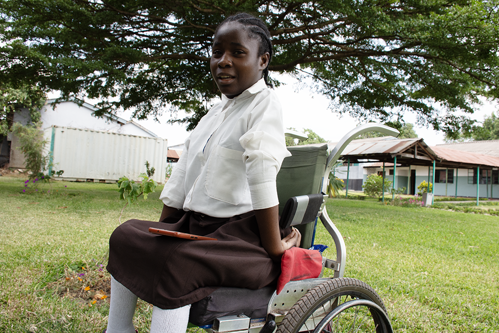 Hope Chipete poses for a photo at Da Gama Special School. She was among 10 girls with disabilities who earned a school scholarship from the office of the First Lady of Zambia through the Merck Foundation, which took up the responsibility to sponsor their education until the tertiary level. (GSR photo/Derrick Silimina)