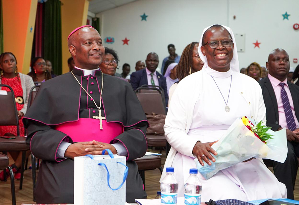 Bishop Wallace Ng'ang'a Gachihi of the Military Ordinariate of Kenya and Sr. Agnes Lucy Lando are pictured at the launch of Lando's new book on Oct. 30 at Paulines Communication Centre in Nairobi, Kenya. (Courtesy of Association for Catholic Information in Africa and FIAT Communications and Consultancy Centre, Nairobi)