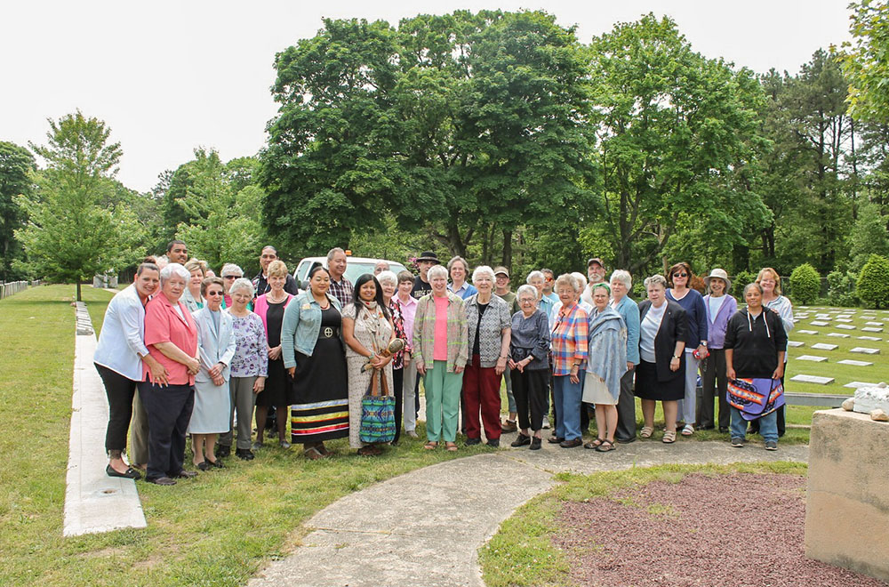 Sisters of St. Joseph, Brentwood, New York, join members of the Shinnecock Indian Nation during a reburial ceremony of Shinnecock Indian remains at the congregation's cemetery, June 5, 2019 (Courtesy of the Sisters of St. Joseph, Brentwood, New York)