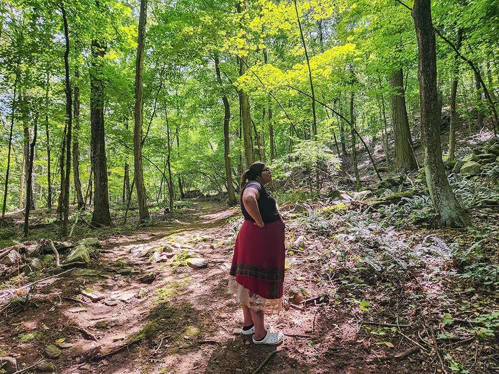 Janiyakuha Webster, of the Stockbridge-Munsee Community Band of Mohican Indians in Wisconsin, during an Aug. 30 outing to the Buttonhook Forest property in Chappaqua, New York. The visit of young people was shepherded by the Dominican Sisters of Hope, whose sponsored ministry, the Center at Mariandale, hosted the visitors. (GSR photo/Chris Herlinger)