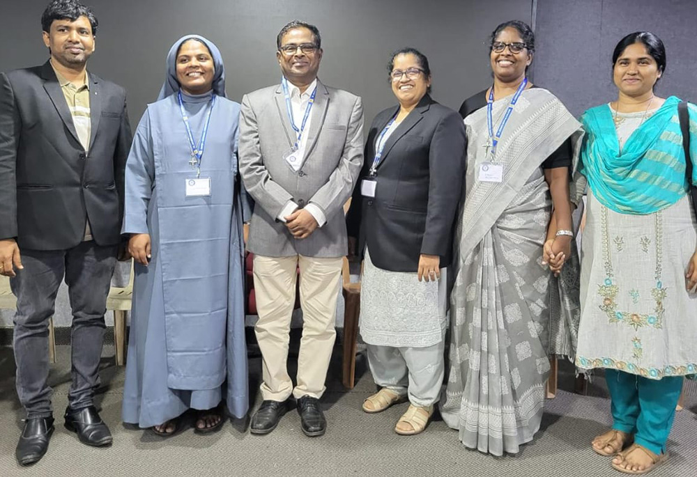 Jesuit Fr. A Santhanam (center), convener of the National Lawyers Forum of Religious and Priests, is pictured with other national body members. (Courtesy of UCA News)