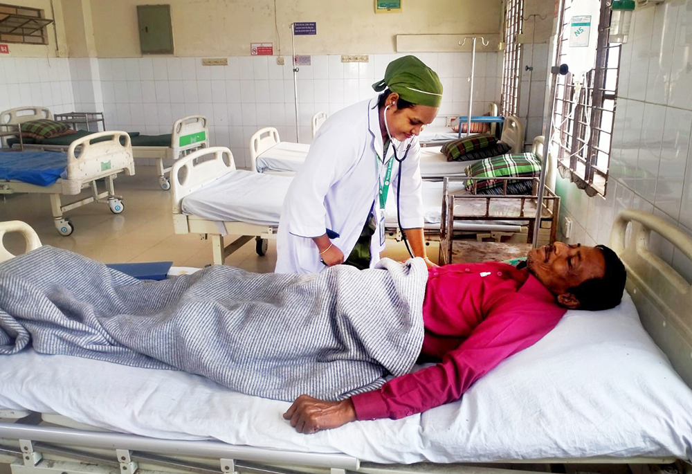 Sathi Terejina Tirki takes care of her patients at a rural government hospital. (GSR photo/Stephan Uttom Rozario)