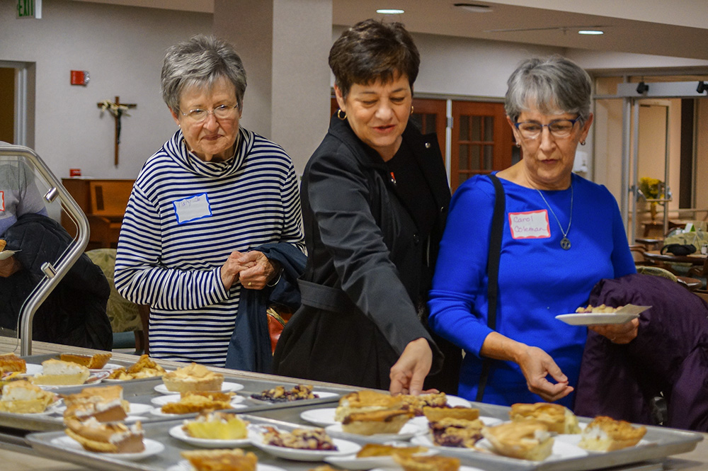 Guests at the Springfield Sisters’ Armchair Tour, held during National Vocation Awareness Week on Nov. 7, 2024, enjoyed pie and listened to stories. The event, hosted by the Ursuline Sisters of the Roman Union, the Hospital Sisters of St. Francis, and the Dominican Sisters of Springfield, Illinois, highlighted the vibrant future of Catholic sisters, built on warm connections, their witness and their response to the Gospel. (Courtesy of Beth Murphy)