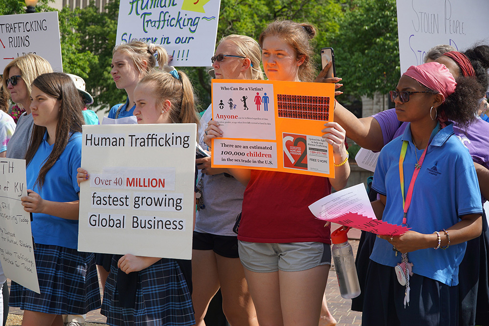 A group including students from Sacred Heart Academy and Presentation Academy in Louisville, Ky., attend a prayer service for victims of human trafficking in 2019 in downtown Louisville. (OSV News/CNS file/The Record/Ruby Thomas)