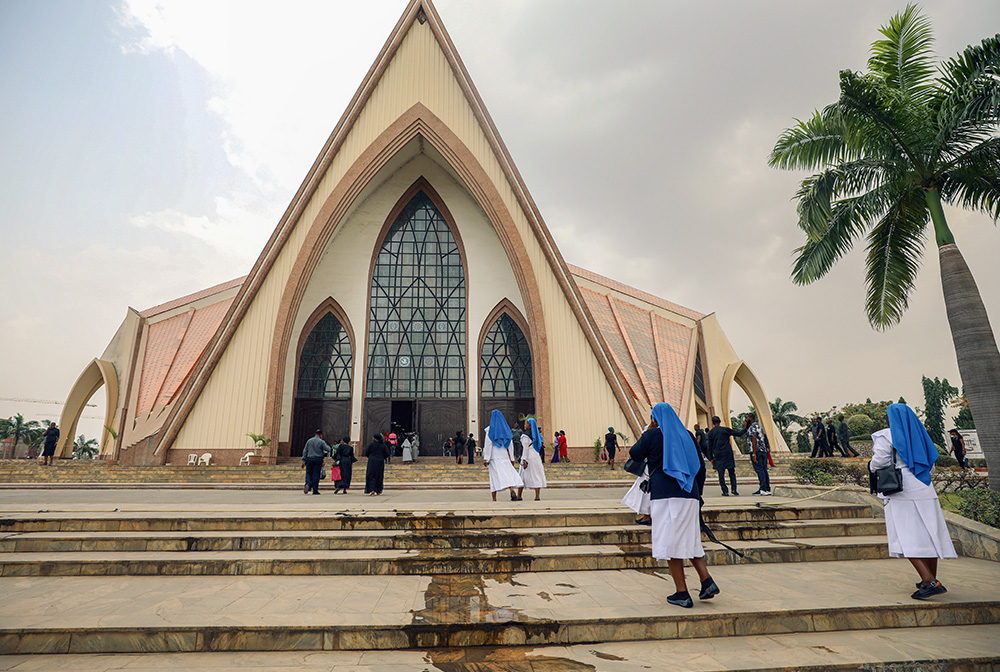 Women religious are pictured in a file photo entering a church in Abuja, Nigeria. (OSV News/Reuters/Afolabi Sotunde)