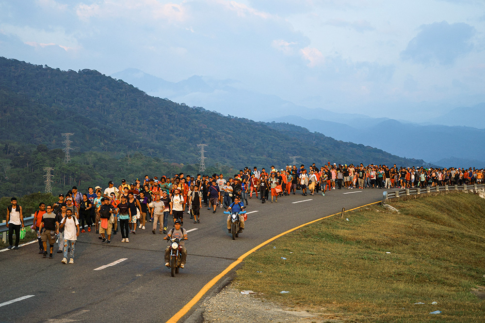 Migrants walk in a caravan bound for the northern border with the United States, in Huixtla, Mexico, Jan. 13, 2025. (OSV News/Reuters/Damian Sanchez)