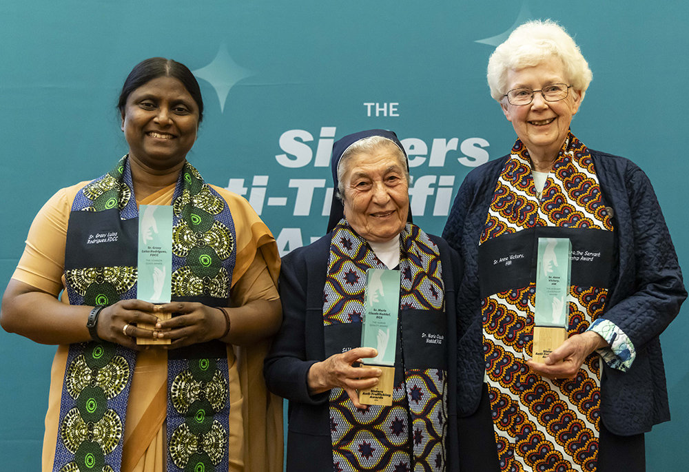 The three awardees at the Sisters Anti-Trafficking Awards are pictured: From left  are Sr. Grasy Luisa Rodrigues of the Canossian Daughters of Charity, from India, who won the Common Good Award for courage and creativity; Sr. Marie Claude Naddaf, of the Good Shepherd Sisters, from Lebanon, who won the Human Dignity Award for lifetime achievement in addressing exploitation; and Sr. Anne Victory, who won the Servant Leadership Award for excellence in network building. (Courtesy of Stefano Dal Pozzuolo)