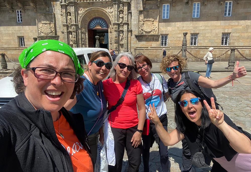 Ana González pauses for a photo along the route with Las Musas, a group of five best friends whose love and commitment to each other deeply inspired her. (Courtesy of Ana González)