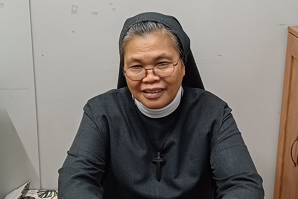 Holy Cross Sr. Herminia Mamarion in her office at Kanlungan ni Maria Home for the Aged in Antipolo City, Philippines (GSR photo/Oliver Samson)