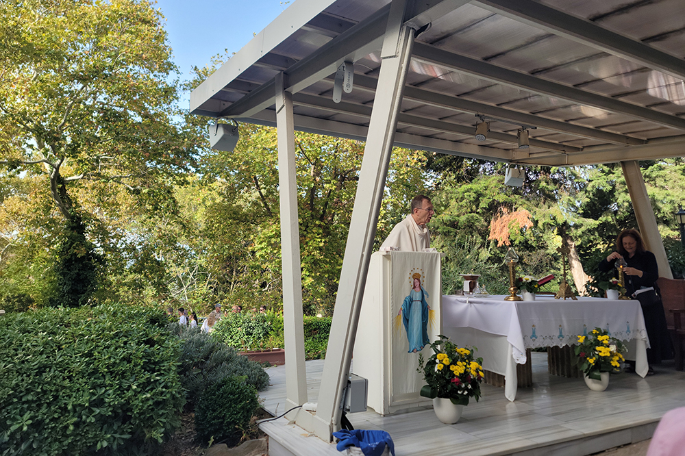 Mass is celebrated by participants in the Catholic Theological Union Greece-Turkey trip on the grounds surrounding Mary's House. This is a popular place for pilgrimages and study groups to celebrate Mass. (GSR photo/Gail DeGeorge)