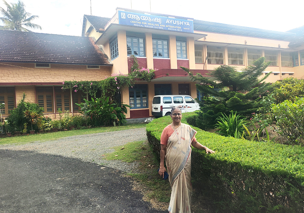 Medical Mission Sr. Eliza Kuppozhackel, the founder of Ayushya Centre for Healing and Integration, poses outside the center at Changanacherry in the southwestern Indian state of Kerala, which was once the congregation's novitiate. (Thomas Scaria)