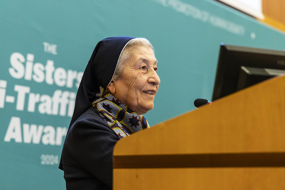 Sr. Marie Claude Naddaf giving a short speech upon receiving the Human Dignity Award for lifetime achievement at the 2024 Sisters Anti-Trafficking Awards. (Stefano Dal Pozzuolo)