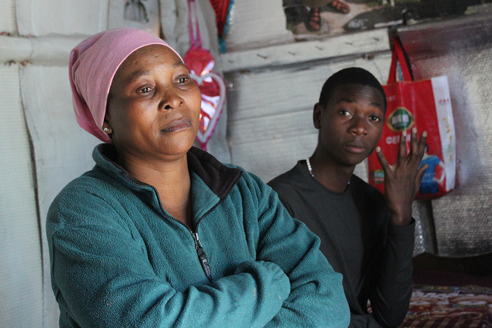 Stanley Joakim, with his mother at their house in Arusha on June 12, 2019. Stanley was kidnapped outside the school gate by unknown people in May 2019. (GSR photo/Doreen Ajiambo)