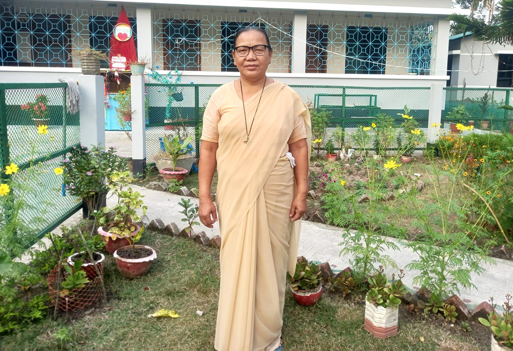 Our Lady of the Missions Sr. Minita Bridgita Chisim is pictured in front of the sisters' house in the coastal Bagerhat District in the Diocese of Khulna, in Bangladesh. (Courtesy of Minita Bridgita Chisim)