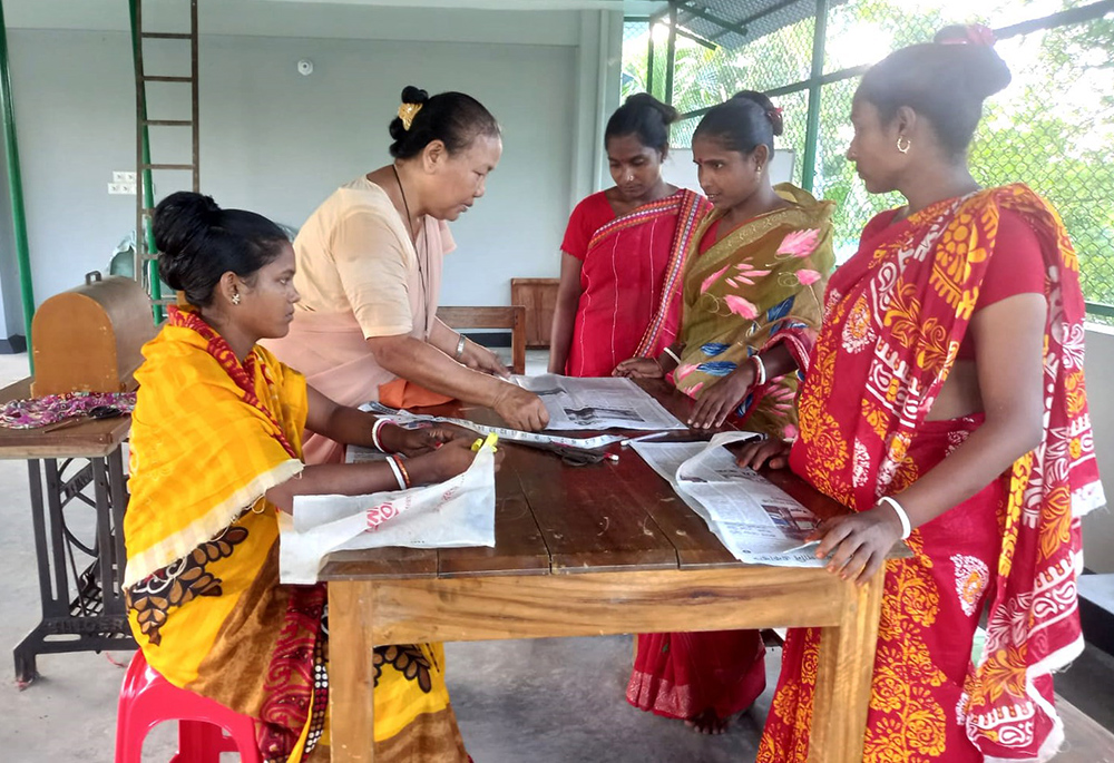 Our Lady of the Missions Sr. Minita Bridgita Chisim teaches tailoring to women in the coastal Bagerhat District, in Bangladesh. (Courtesy of Minita Bridgita Chisim)