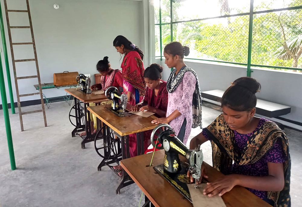 Our Lady of the Missions Sr. Minita Bridgita Chisim teaches sewing to poor girls in the coastal Bagerhat District. (Courtesy of Minita Bridgita Chisim)