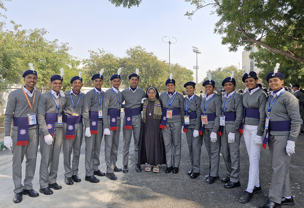 Congregation of the Mother of Carmel Sr. Noel Rose is pictured with a 12-member contingent of the National Service Scheme at Jawaharlal Nehru Stadium in New Delhi, India. (Courtesy of Sr. Noel Rose)