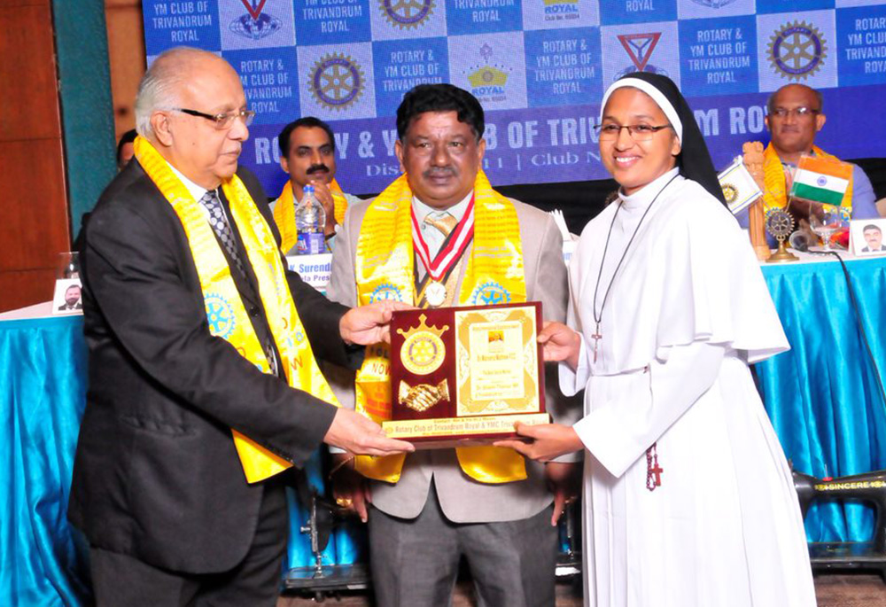 Sr. Mareena Mathew receives the Roy Mulakupadam Samaritan Award for her selfless service to children believed to be affected by endosulfan, at a function held at Kottayam, a town in the southwestern Indian state of Kerala, in October 2024. (Courtesy of Mareena Mathew)