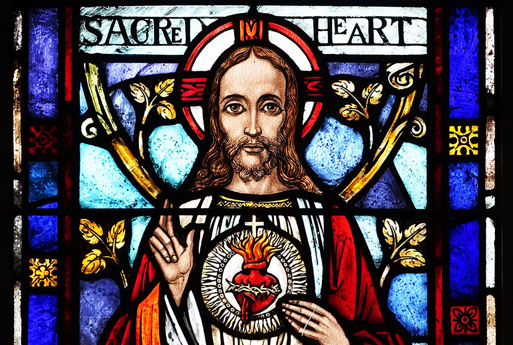 The Sacred Heart of Jesus is depicted in a stained-glass window at Our Lady Queen of Martyrs Church in the Forest Hills section of the Queens borough of New York. (OSV News/Gregory A. Shemitz)