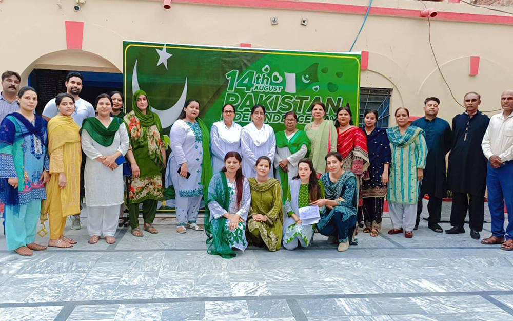 Sr. Nasreen Gian (center) celebrates Pakistan's Independence Day on Aug. 14, 2024, with her staff of Sacred Heart High School in Rawalpindi. (Courtesy of Sr. Nasreen Gian)