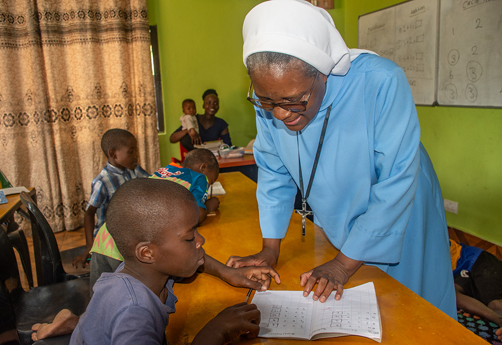 Sr. Catherine Mpolokoso of the Little Servants of Mary Immaculate conducts lessons for young learners at St. Lawrence Home of Hope in Lusaka, Zambia. (Derrick Silimina)