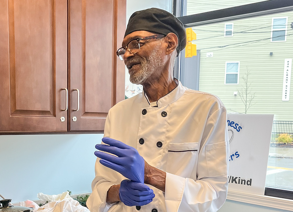 Chris Gibson, a neighborhood resident, prepared a Thanksgiving feast for St. Joseph's Place guests. (Sara Foss)