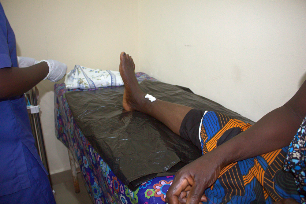 A patient's leg is treated at the clinic's dressing room. The sisters offer holistic intervention to indigent Nigerians in the Torugbene community of Nigeria's Delta State.