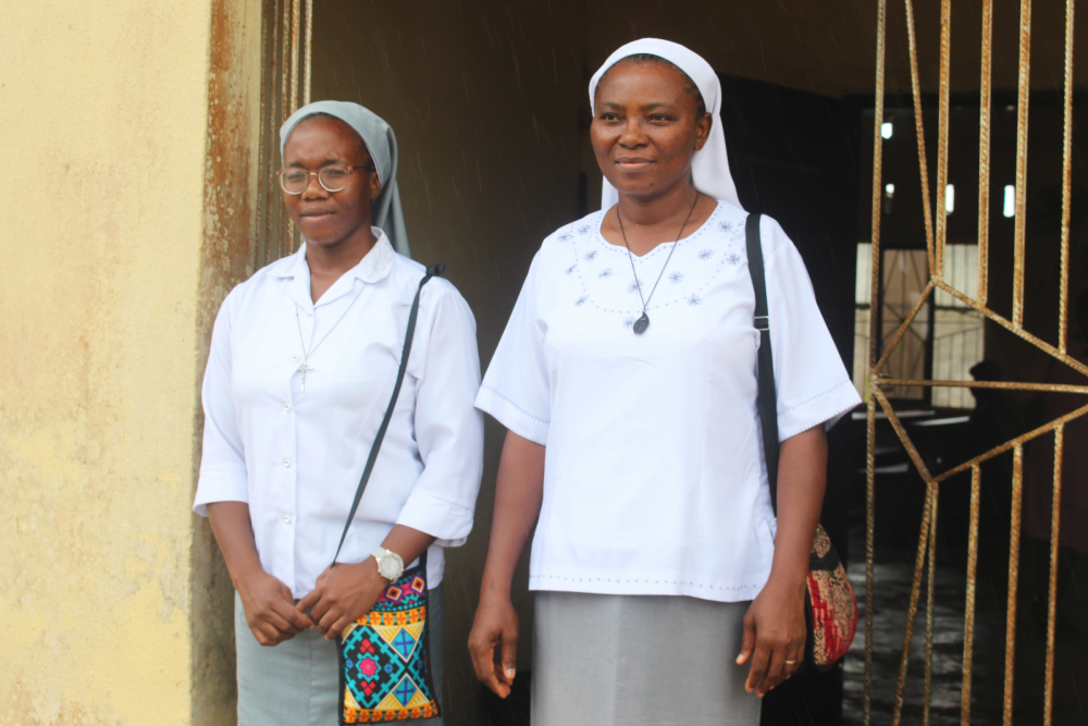 Sr. Janefrances Ihekuna, administrator of the MMM sisters' Mary Martin Primary Health Center and Sr. Helen Omeya, acting matron at the health center, pose for a photo after Mass at the Immaculate Heart Parish, Torugbene on Sunday, September 17, 2024.