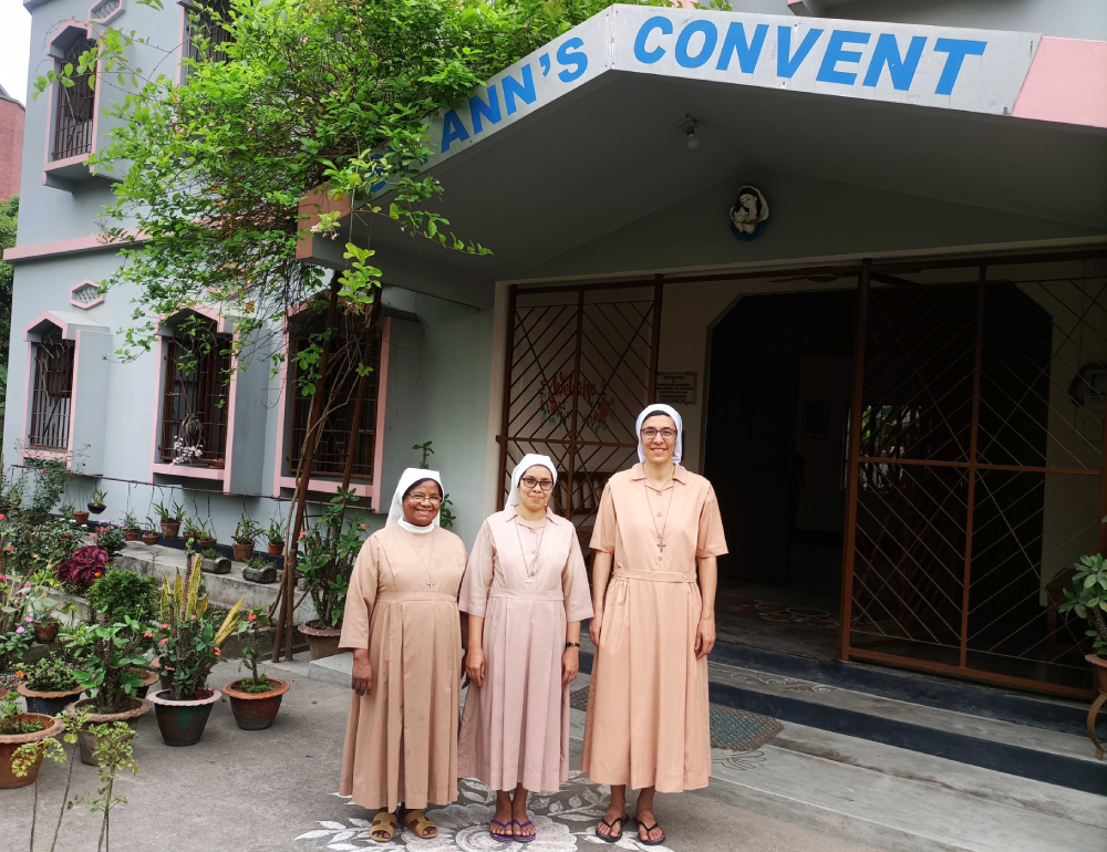 Sr. Lorenza Raffaella Radini (right), Sr. Shiuli Beck, community leader (middle) and Sr. Teresa Gomes (left), who are in charge of the pastoral work, in front of the convent. (Stephan Uttom Rozario)