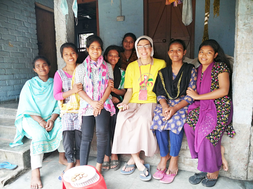 Sr. Lorenza Raffaella Radini visits a rural Indigenous village while she attends national youth day in the Dinajpur diocese. (Stephan Uttom Rozario)