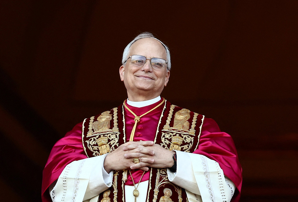 Cardinal Robert Francis Prevost, who has chosen the papal name Leo XIV, appears on the central balcony of St. Peter's Basilica at the Vatican May 8, 2025, following his election during the conclave. (OSV News/Reuters/Yara Nardi)