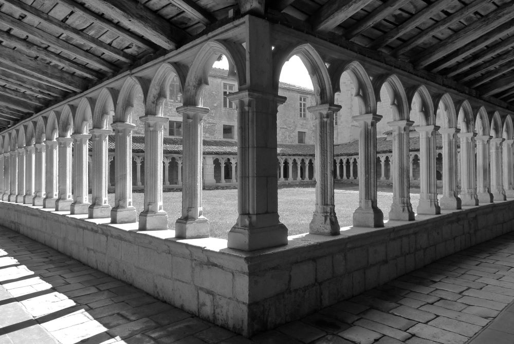 Courtyard surrounded by open arched windows Courtyard surrounded by open arched windows