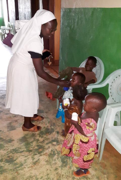 Holy Union Sr. Josephine Nko Ndindi works with children in the hospital at Baba 1, Cameroon. (Courtesy of Josephine Nko Ndindi)