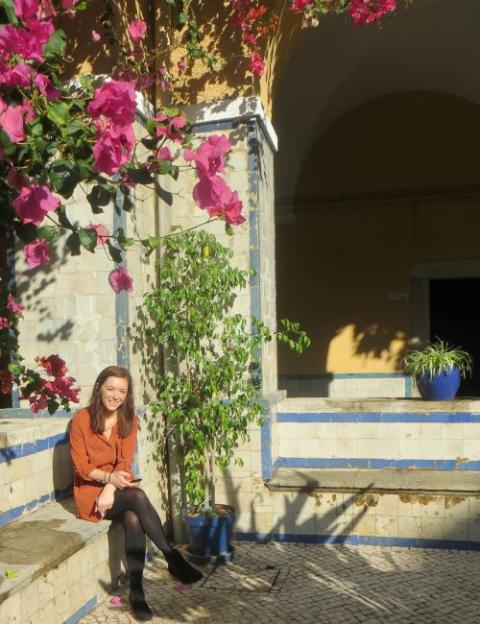 Bronagh McShane sits in the cloister garden of the Convento de Nossa Senhora do Bom Sucesso, Lisbon, Portugal. (Courtesy of Caroline Bowden)