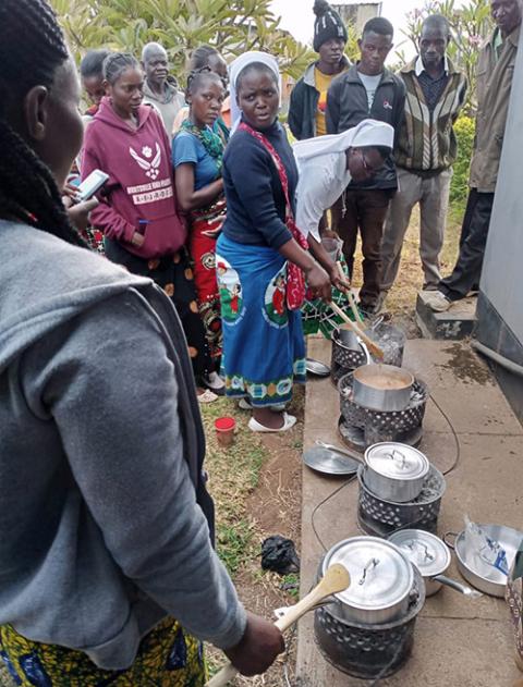 Mercy Sr. Christabel Kazembe teaches caregivers how to prepare local dishes during a nutrition session. (Courtesy of Christabel Kazembe)