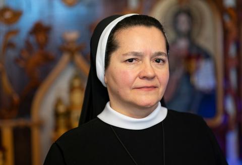 Sr. Yanuariya Isyk, a member of the Sisters of the Order of St. Basil the Great whose ministry is based in the capital of Kyiv, is pictured in the chapel of a small monastery apartment shared with two other sisters. (GSR photo/Gregg Brekke)