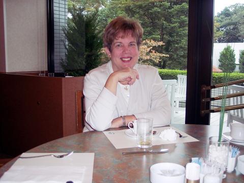 Adrian Dominican Sr. Donna Markham, then prioress, relaxes during an October 2005 visit to the Dominican Sisters of Our Lady of Remedies in Pampanga, Philippines. The Adrian Dominican Sisters helped with the formation of the Remedies Congregation’s first sisters in the 1960s, and the two congregations merged in 2011. (Photo courtesy of Adrian Dominican Sisters)